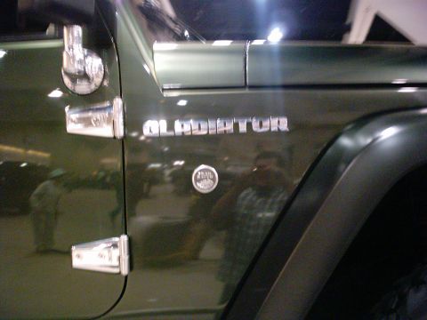 1986 Ford Bronco - Close-up of the fender badge on a Jeep Gladiator.