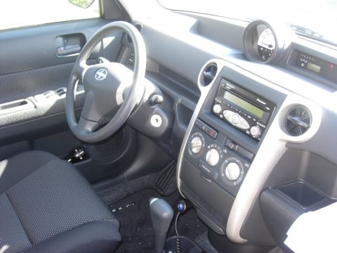 2006 Scion xB - Interior view of a 2006 Scion xB, highlighting the dashboard and driver's area.