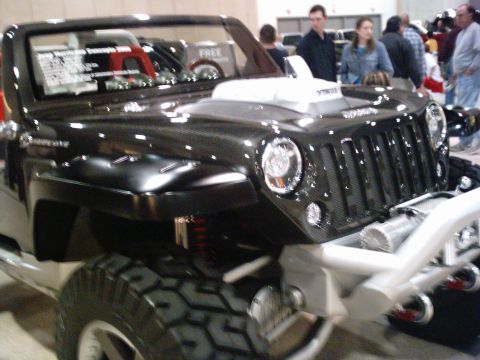 1986 Ford Bronco - This modified Jeep Wrangler features a custom hood and grille, deviating from the claimed 1986 Ford Bronco.