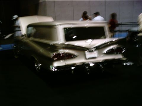 1986 Ford Bronco - This 1959 Chevrolet Brookwood wagon is seen from the rear with its hood open.
