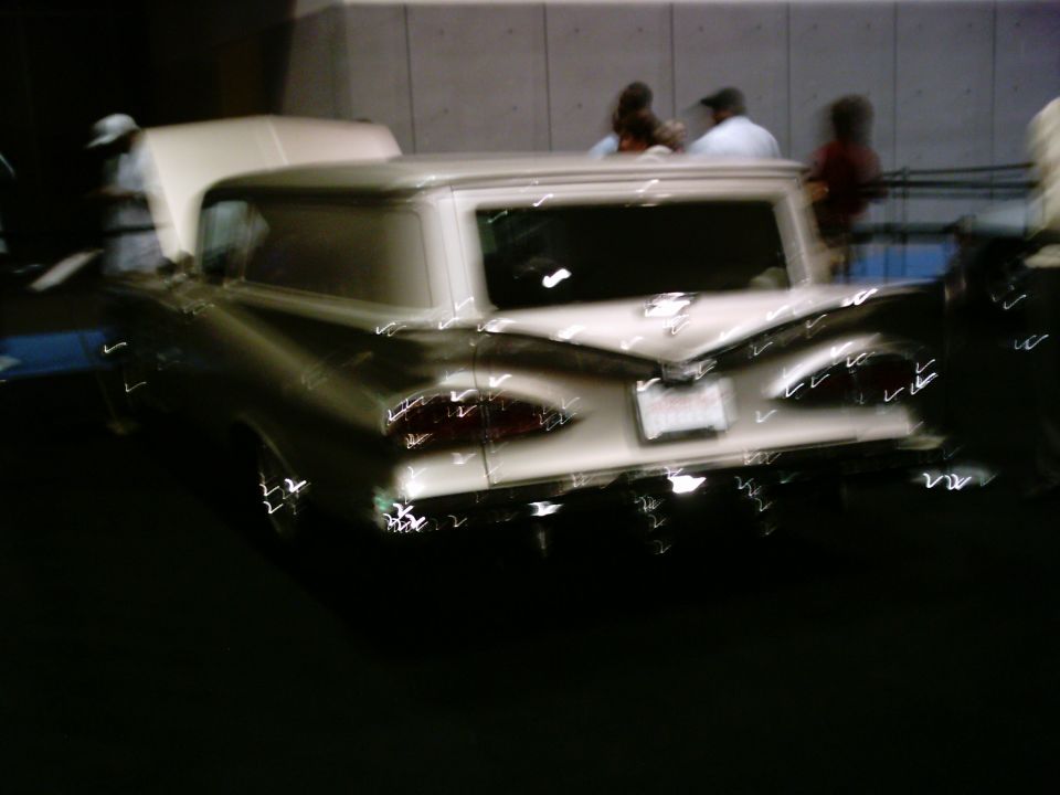 Rear view of a 1959 Chevrolet Brookwood wagon with its hood open