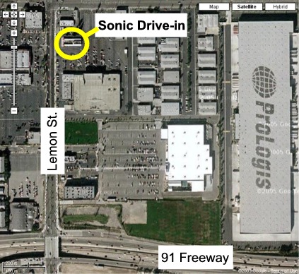 1993 Ford Bronco - An aerial view shows a Sonic Drive-in and a large Prologis warehouse complex near a freeway.