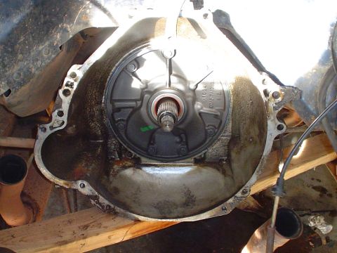 1984 Ford Bronco - Close-up view of a vehicle's transmission bell housing, showing the torque converter assembly.