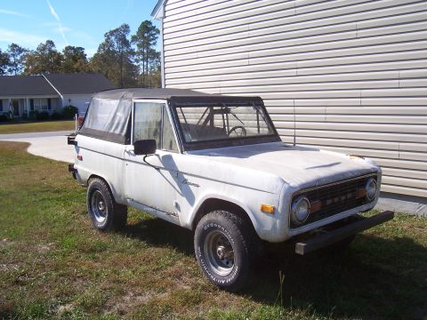 1974 Ford Bronco - This 1974 Ford Bronco is shown in a three-quarter front view, parked outdoors.