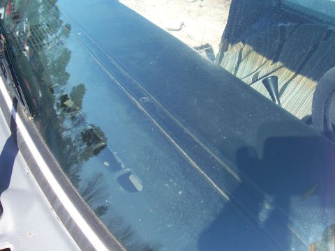 1978 Ford Bronco - There are five holes like this that run across the top of the dashboard. They have nothing to do with removing the dashpad.