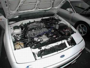 1990 Ford Probe - 1990 Stock Probe GL engine bay. 2.2L (4) cyl. Naturaly aspirated engine.