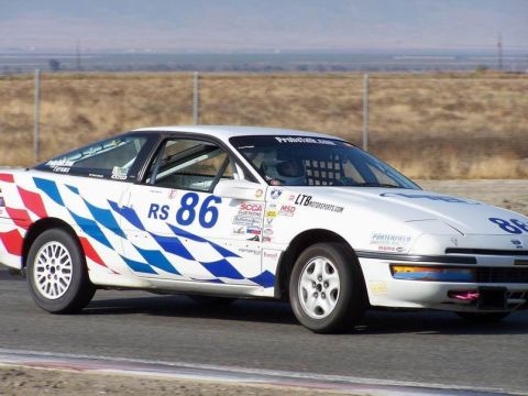 1990 Ford Probe - 1st Gen 1990 GL shown in SCCA Club racing trim. Race-Track: Buttonwillow