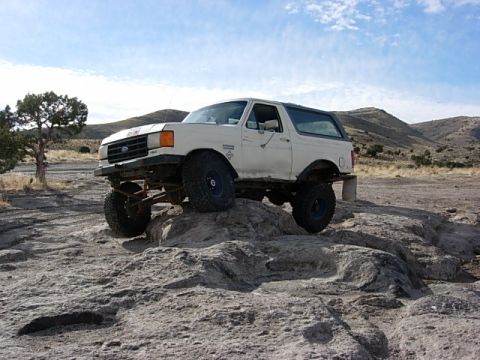 1987 Ford Bronco - me perched perfectly on a rock showing my flex off