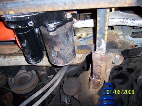 1985 Ford Bronco - Underside view of engine parts and vehicle frame, with a date watermark.
