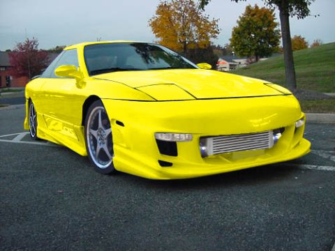 1994 Ford Probe - Modified 1994 Ford Probe with custom body kit and intercooler, seen from the front three-quarter view.