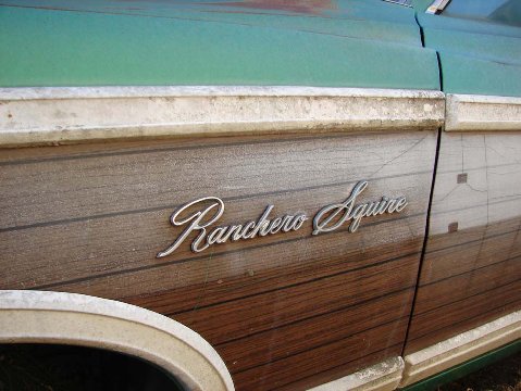1972 Ford Ranchero - Close-up of the Ranchero Squire emblem on a vehicle's side panel.