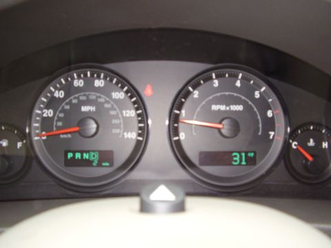 1997 Ford Taurus - The vehicle's interior dashboard displays speed, RPM, and gear selection, but no year is visible.