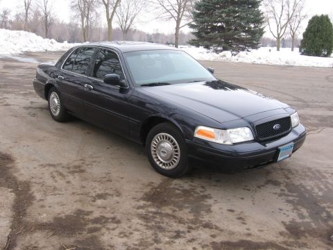 1999 Ford Crown Victoria - This Ford Crown Victoria has a grille and headlight design consistent with models from 2003-2011.