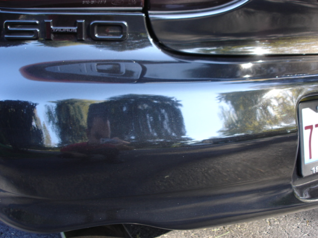 1998 Ford Taurus rear bumper with SHO badging and a license plate