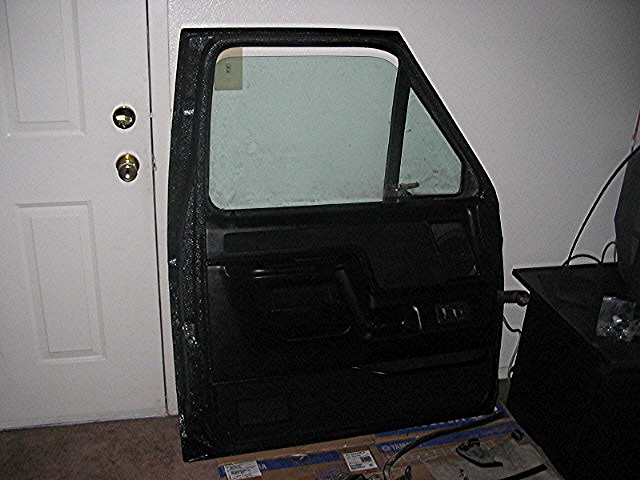 Black car door with window