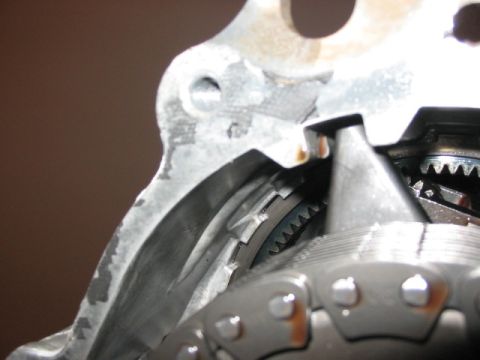 1995 Ford Bronco - Internal view of a vehicle's transfer case, showing chain and gear mechanisms.