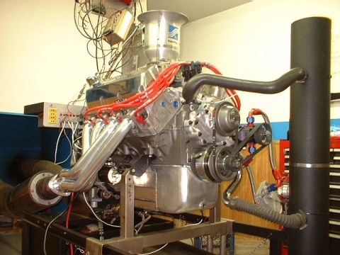 1972 Ford Ranchero - A V8 engine is set up on a dynamometer stand for testing and tuning.
