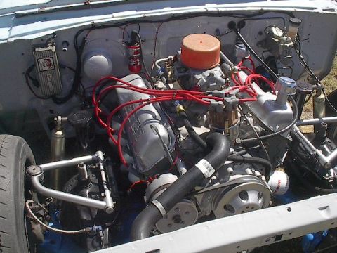 1972 Ford Ranchero - The engine bay of a 1972 Ford Ranchero features a V8 engine with an MSD ignition system and a prominent orange air filter.