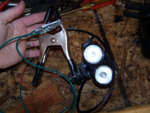 1986 Ford Bronco - Automotive diagnostic tool with alligator clips and dual lights, likely for electrical testing.
