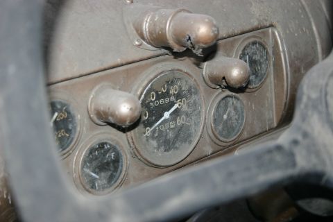 2003 Jeep TJ - Dashboard gauges are visible in this close-up of an old vehicle's interior.