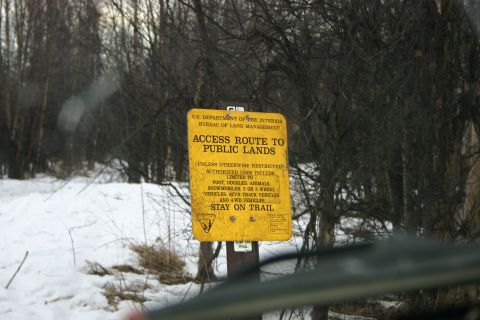 2003 Jeep TJ - A sign indicates an access route to public lands, with restrictions on vehicle types and a reminder to stay on the trail.