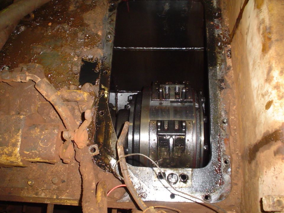 Close-up of a rusty machine's internal clutch assembly