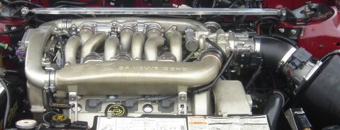 1991 Ford Taurus - Engine bay of a 1991 Ford Taurus SHO, showing the 24 valve DOHC engine.