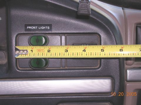 1994 Ford Bronco - A tape measure is placed across the 'FRONT LIGHTS' switch panel on a vehicle's dashboard. The date '10.20.2005' is visible in the lower rig…