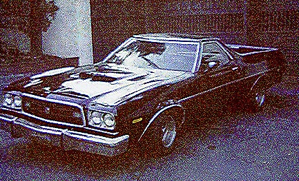 1973 Ford Ranchero - This 1973 Ford Ranchero is captured in a 3q-front view, its distinctive pickup truck bed and coupe-like front end.