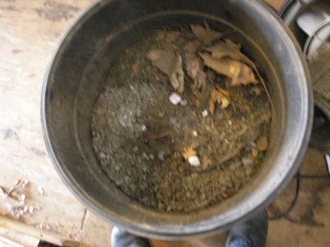 1978 Ford Bronco - Tightened down the bolts on the window track too tight... the remains of the glass in my shop vac