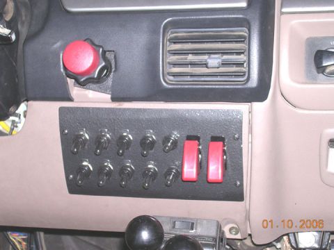 1994 Ford Bronco - This is way more switches than i need currently. The coverd switches are for the upcoming line locks. The two to the left of that are 3 pos…