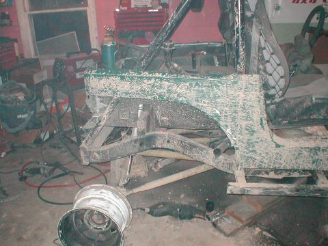 1983 Ford Bronco - This vehicle appears to be undergoing significant modification or repair in a workshop setting.