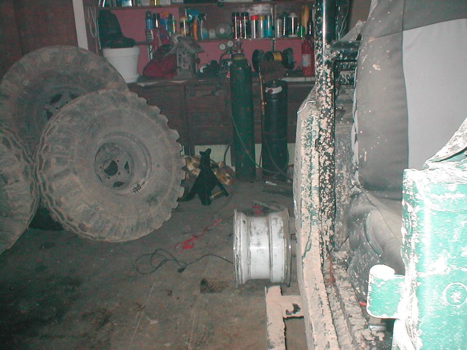 Vehicle interior with large tires and a spare rim