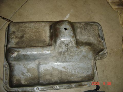1990 Ford Bronco - 1/2" hole drilled in pan low point.