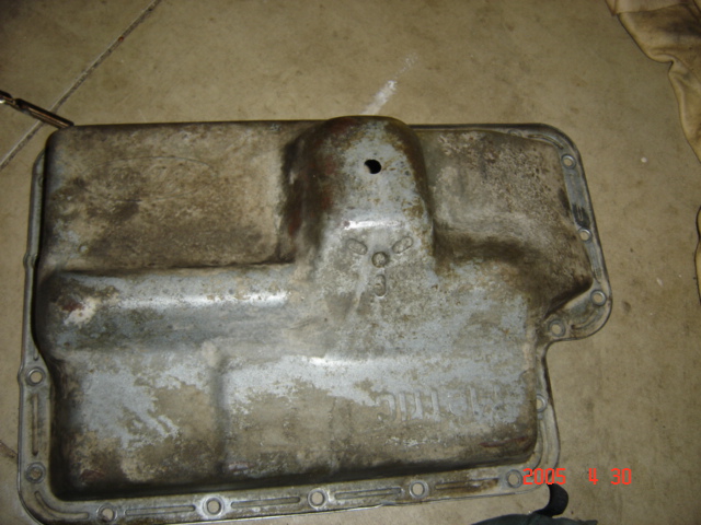 1/2" hole drilled in pan low point.