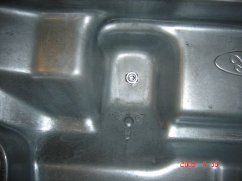 1990 Ford Bronco - Drain plug installed, inside shot.