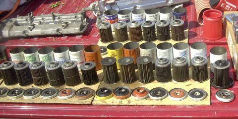 1997 Ford Taurus - Various oil filters and their corresponding gaskets are displayed, suggesting a selection for automotive maintenance.
