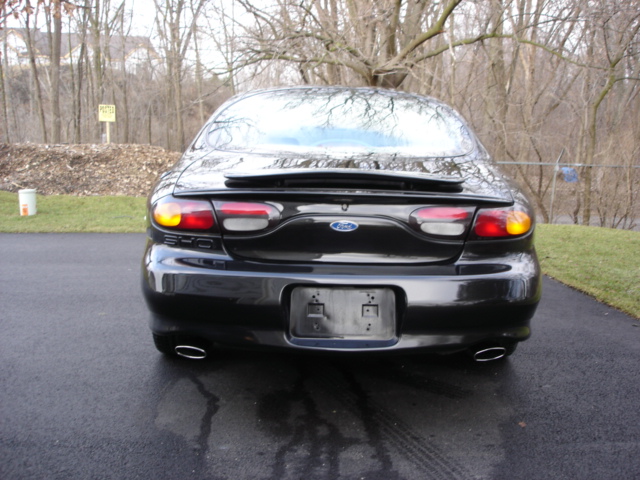 1998 Ford Taurus rear view with dual exhaust tips and spoiler