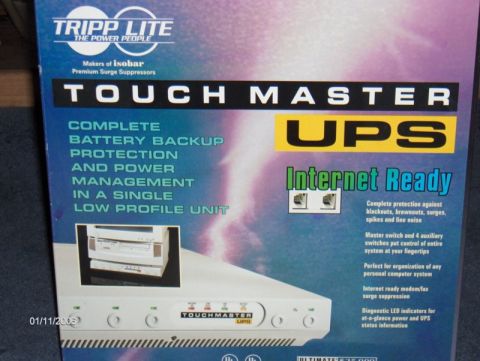 1994 Mazda MX-6 - Box for a Tripp Lite Touch Master UPS, showing product features and a small image of the unit.
