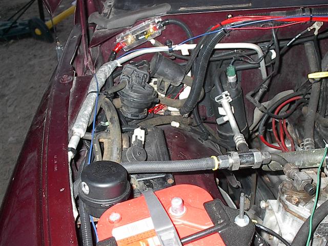 Engine bay with custom wiring and fuse box