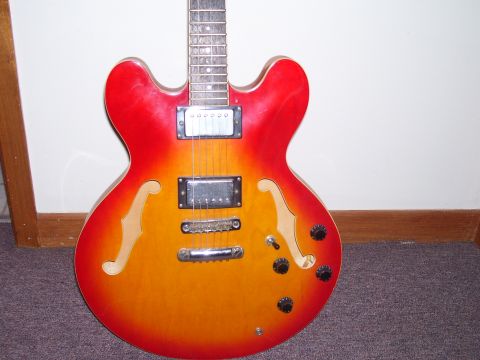 1984 Ford Bronco - This electric guitar has a sunburst finish and chrome hardware.