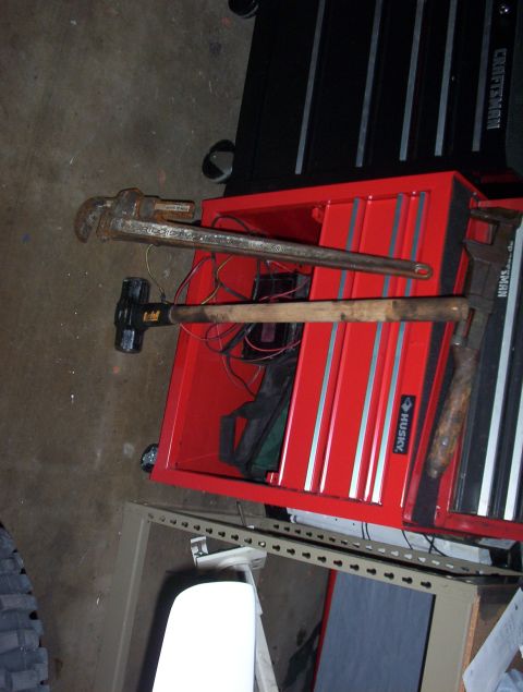 1993 Ford Bronco - A red Husky toolbox is shown with a pipe wrench and a sledgehammer resting on top.
