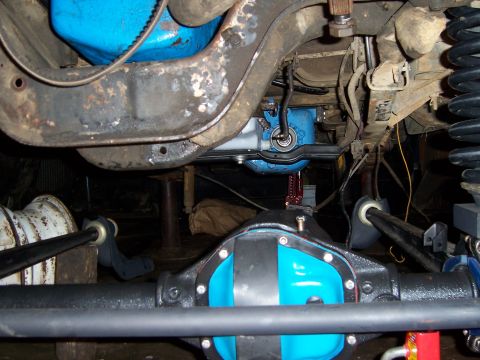 1983 Ford Bronco - Close-up view of a vehicle's rear differential and suspension system, showing custom blue accents.