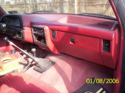 1988 Ford Bronco - Interior view of a 1988 Ford Bronco, the dashboard, shifter, and seating.