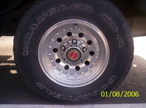 1988 Ford Bronco - Close-up of a tire and wheel assembly, showing the Goodyear Wrangler GS-A branding.