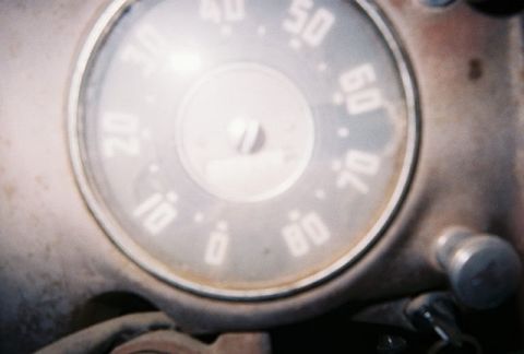 1992 Ford Bronco - The speedometer shows speeds up to 80, with the needle pointing somewhere below 10.