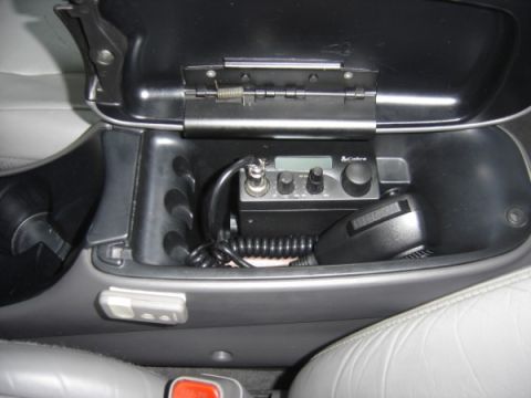 1999 Ford Taurus - CB radio and microphone are visible inside the center console of a vehicle.