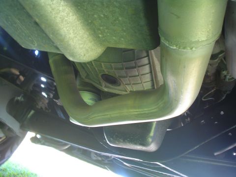 2005 Ford Excursion - Underside view of vehicle exhaust pipes and transmission pan.