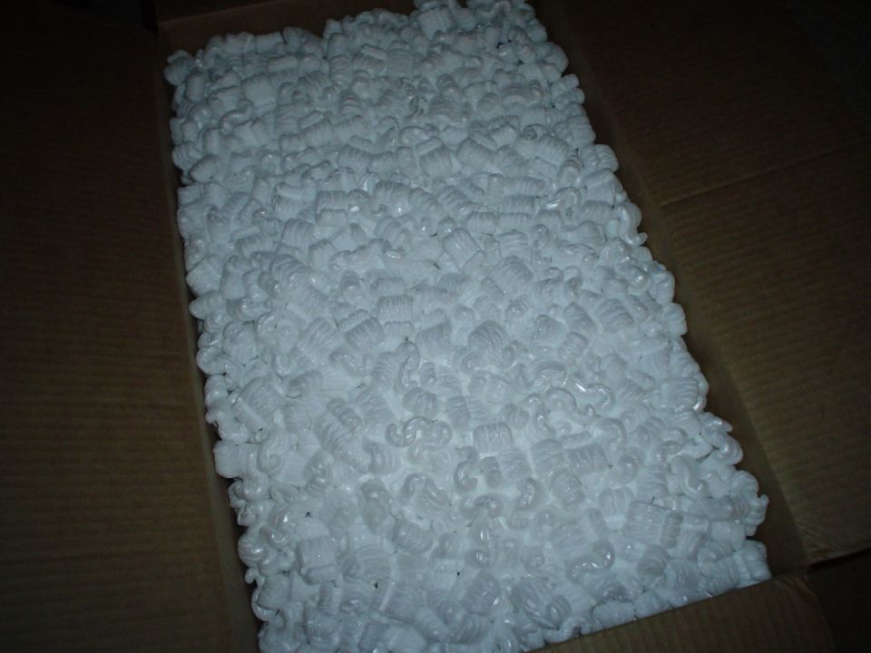 Box filled with white packing peanuts