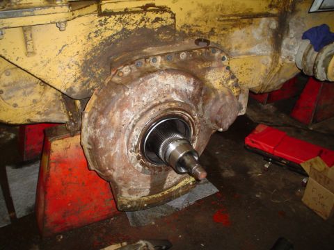 1966 International School Bus - Close-up view of a heavily used axle housing from a piece of heavy machinery.